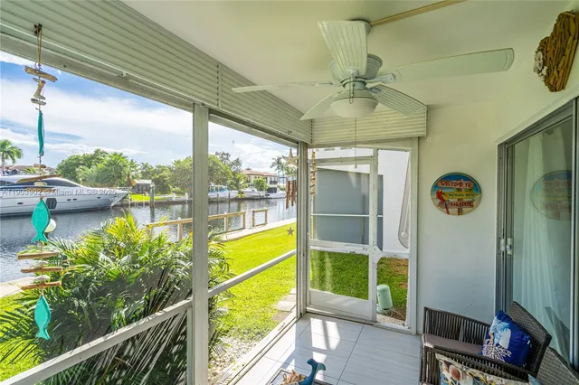 a view of a porch with seating space