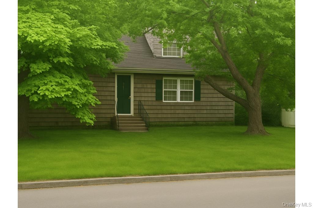 a view of a house with a backyard