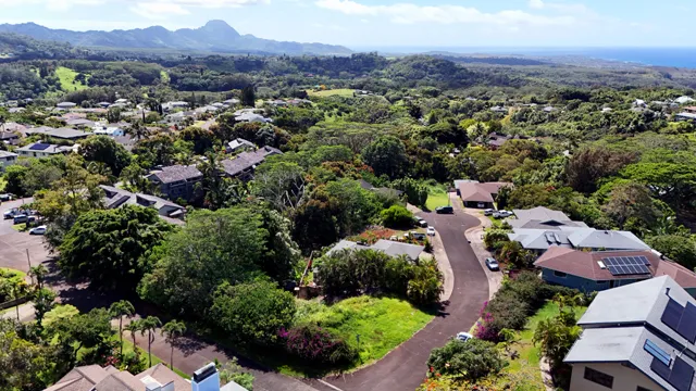 an aerial view of a town with couple of houses