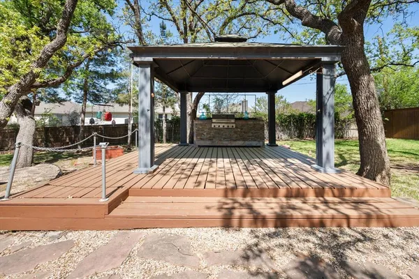 a outdoor space with patio the couches and a dining table with chairs