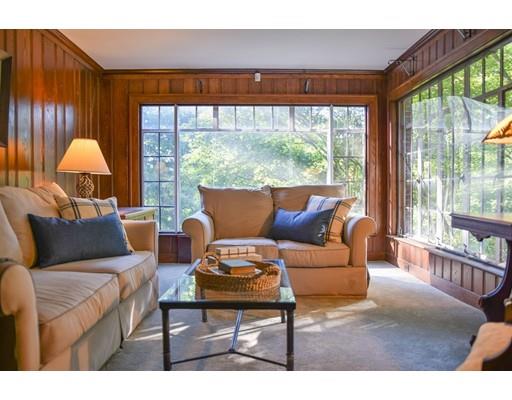 1192 Main Street Athol, MA 01331 - Photo 11 of 30 a living room with furniture a large window and a flat screen tv