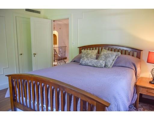 1192 Main Street Athol, MA 01331 - Photo 15 of 30 a bedroom with a bed and wooden floor