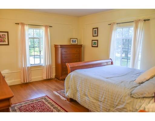 1192 Main Street Athol, MA 01331 - Photo 17 of 30 a bedroom with a bed and wooden floor