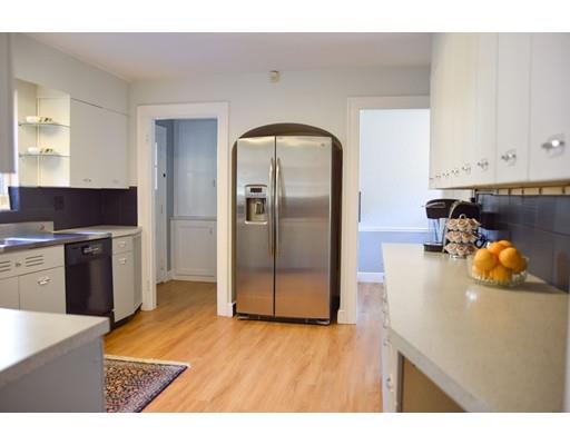 1192 Main Street Athol, MA 01331 - Photo 8 of 30 a kitchen with stainless steel appliances granite countertop a refrigerator a stove and a sink with wooden floor