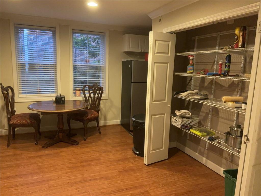 544 East Ponce De Leon Avenue, Unit TERRACE Decatur, GA 30030 - Photo 5 of 18 a dining room with furniture and a window