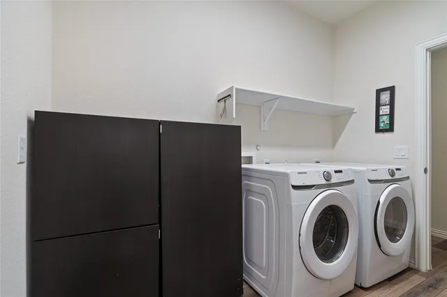a utility room with dryer and washer