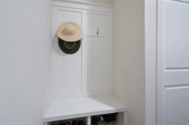 a bathroom with a sink and a window
