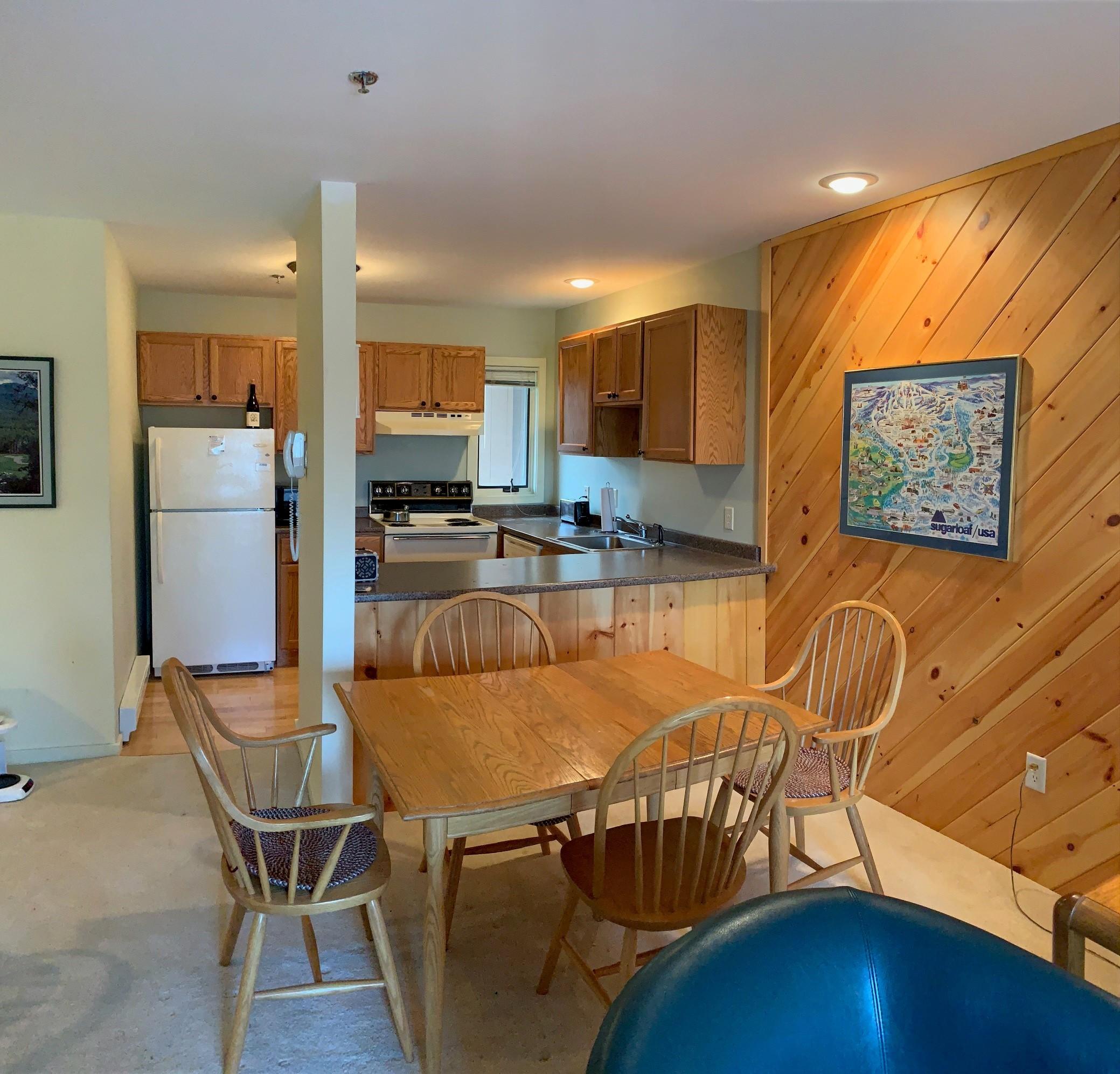 9 Mountain Side Road, Unit 9 Kingfield, ME 04947 - Photo 3 of 11 Kitchen and Dining area