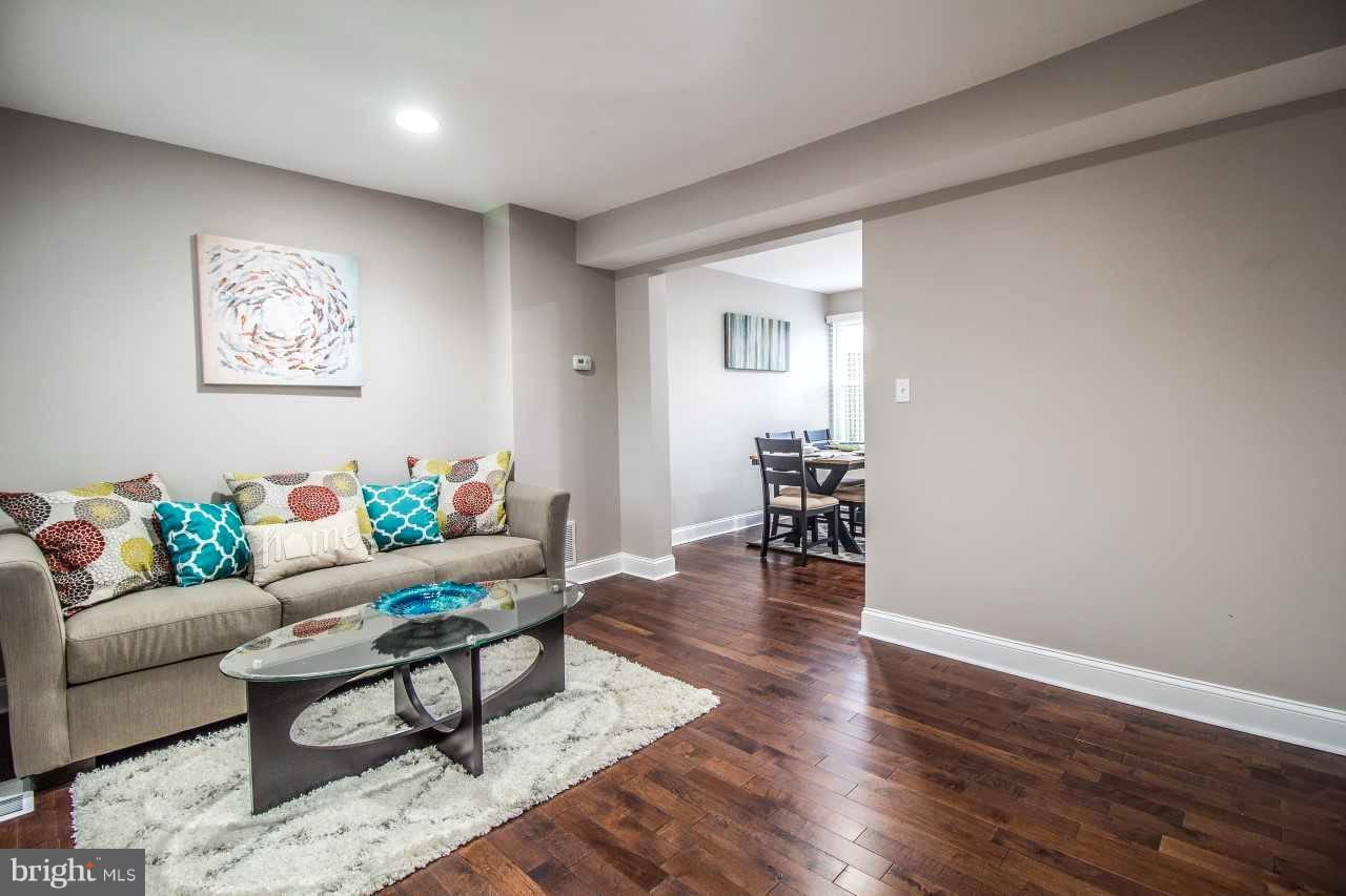 37 Northship Road Baltimore, MD 21222 - Photo 2 of 23 a living room with furniture and wooden floor