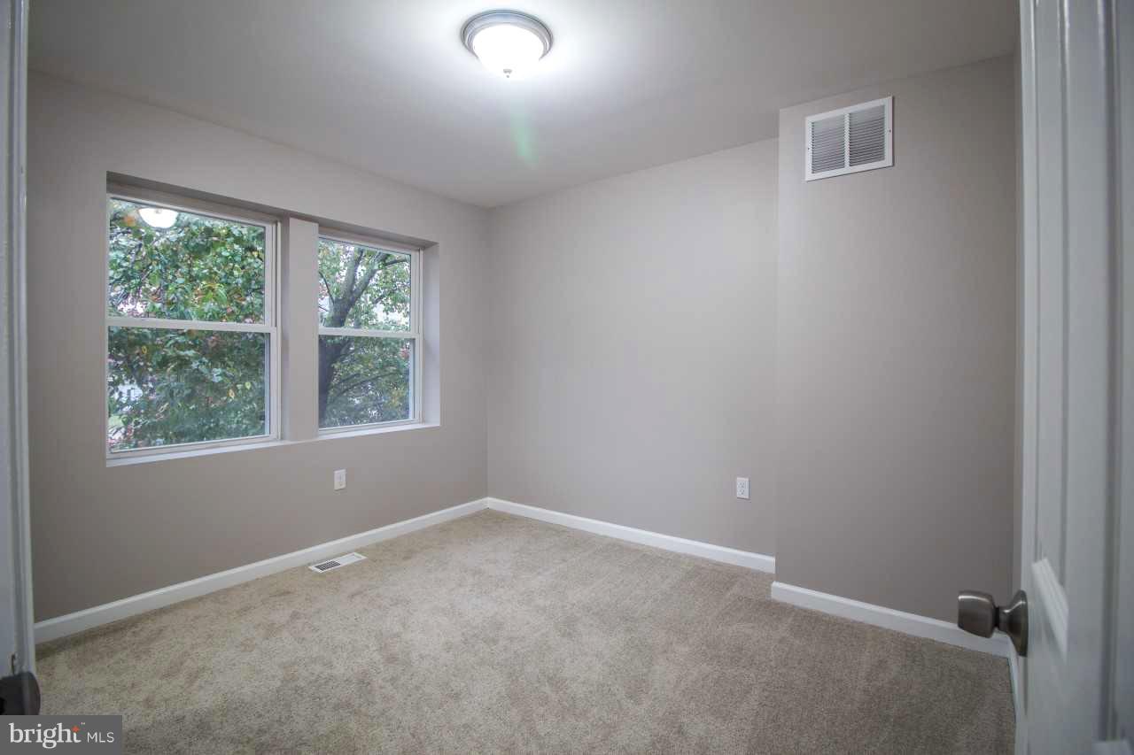 37 Northship Road Baltimore, MD 21222 - Photo 11 of 23 an empty room with windows