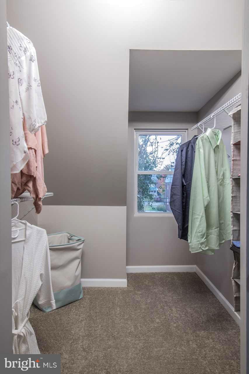 37 Northship Road Baltimore, MD 21222 - Photo 16 of 23 a bathroom with a shower curtain and a window