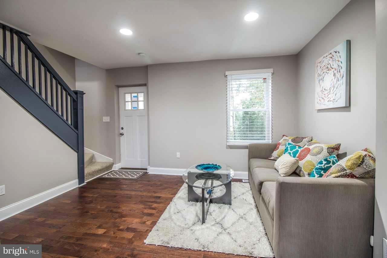37 Northship Road Baltimore, MD 21222 - Photo 3 of 23 a living room with furniture and a window