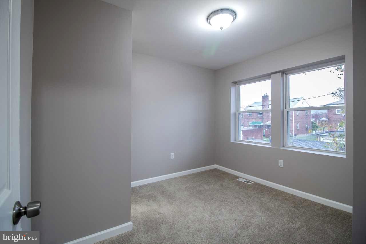 37 Northship Road Baltimore, MD 21222 - Photo 8 of 23 an empty room with windows