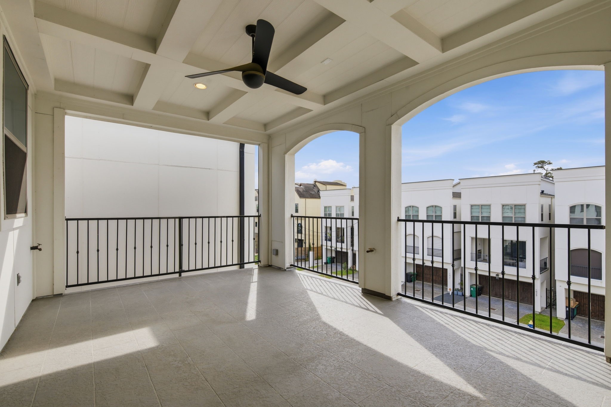 1906 West 25th Street Houston, TX 77008 - Photo 31 of 47 Balcony, off the third floor flex room. Notice the ceiling details. Gas , electric, and water hookups in place, allowing for potential to have an outdoor kitchen and hot tub if desired!