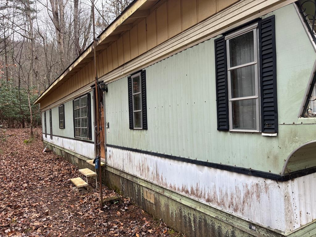 366 Gander Gap Road Hiawassee, GA 30546 - Photo 1 of 13 a front view of a house with a yard