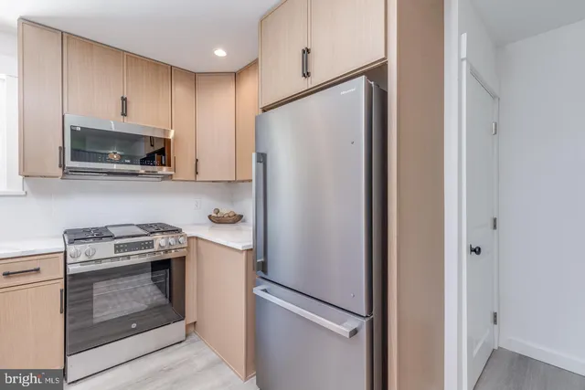 a bathroom with a shower and toilet