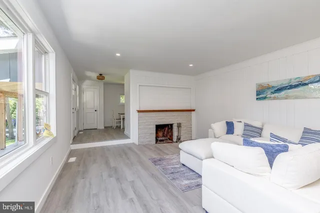 a living room with a fireplace