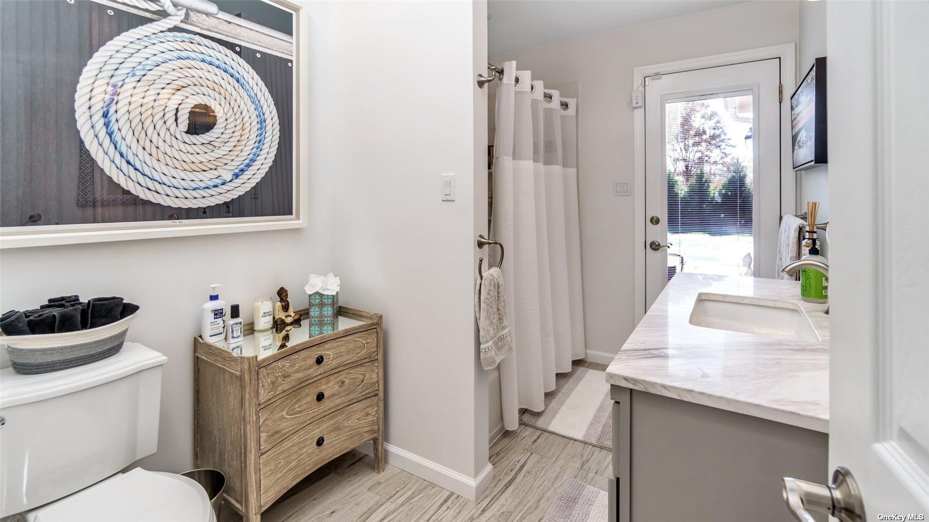 60 Lynncliff Road Hampton Bays, NY 11946 - Photo 34 of 35 a room with storage and utility racks