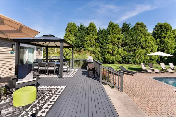 an outdoor space with furniture