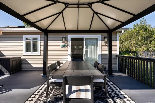 a front view of a house with patio