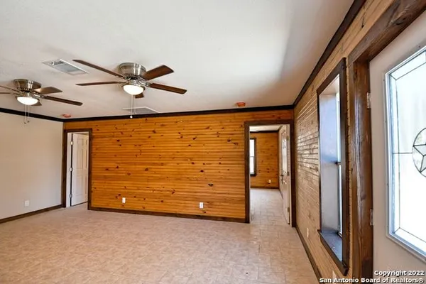 an empty room with window