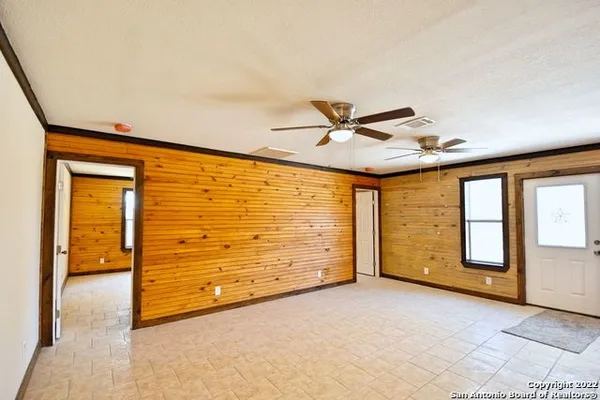 a view of an empty room and window