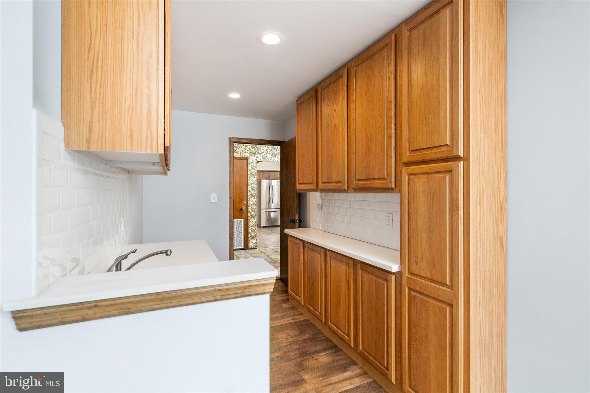 87 Limewood Drive Hamilton, NJ 08690 - Photo 21 of 34 a bathroom with a sink and a mirror