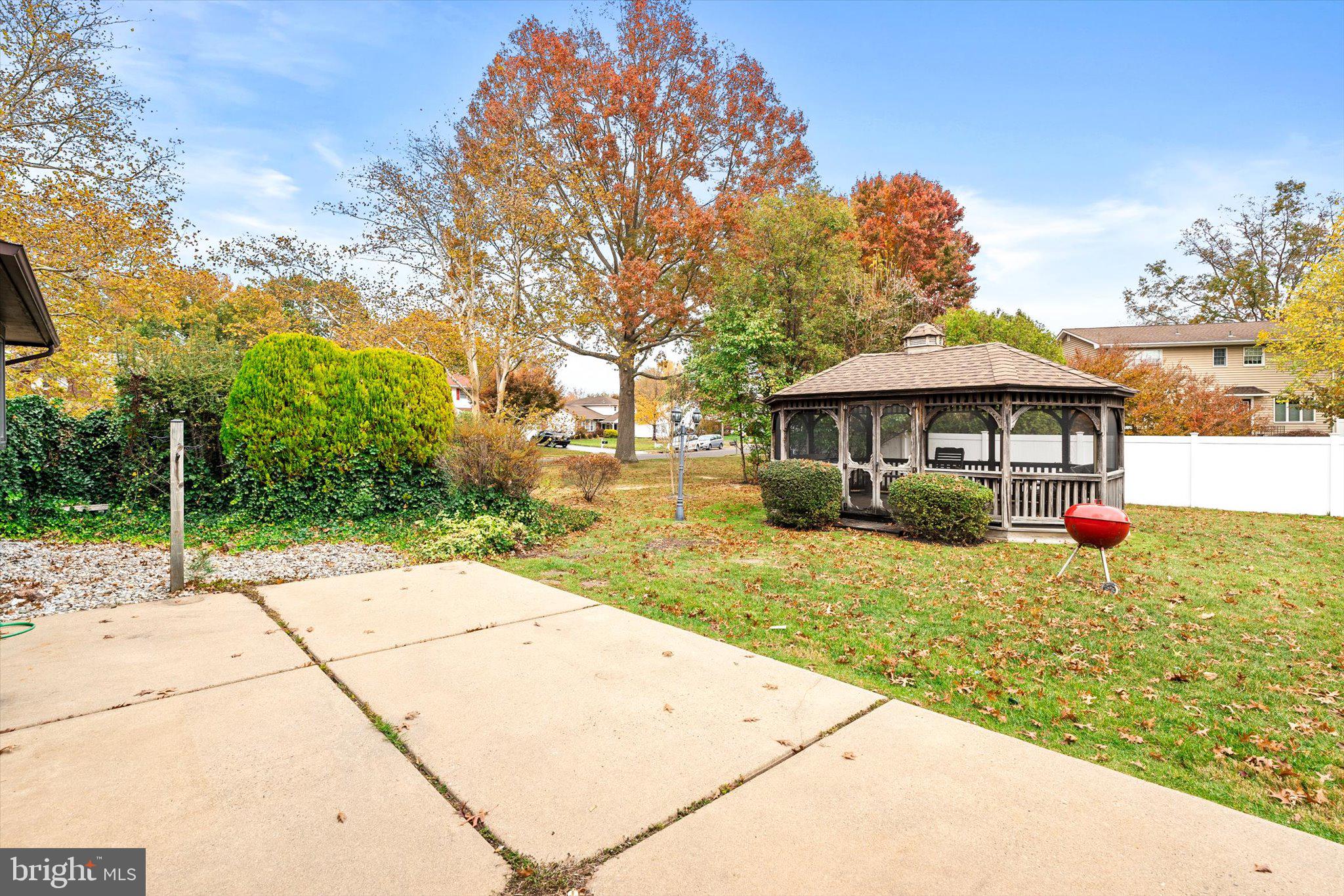 87 Limewood Drive Hamilton, NJ 08690 - Photo 30 of 34 a front view of a house with garden