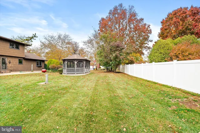 a view of house with swimming pool
