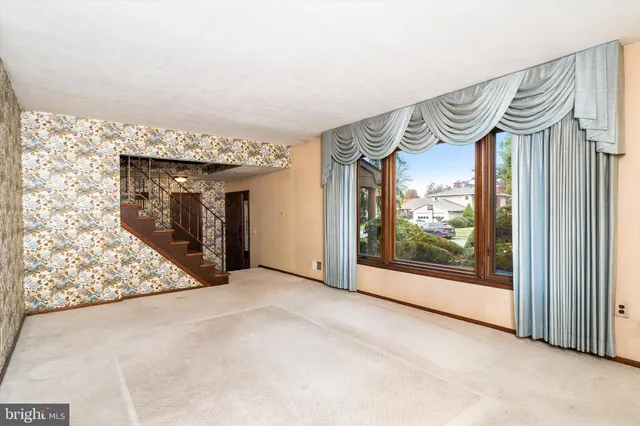 a view of a fireplace in an empty room