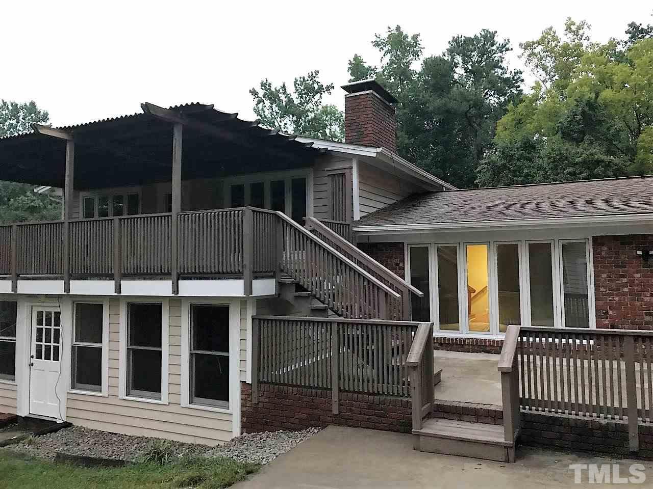 3204 Timberlake Road Raleigh, NC 27604 - Photo 5 of 25 a front view of a house with a porch