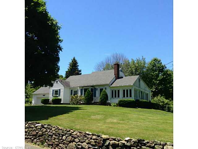 381 Plungis Road Watertown, CT 06795 - Photo 1 of 1 a front view of a house with a garden