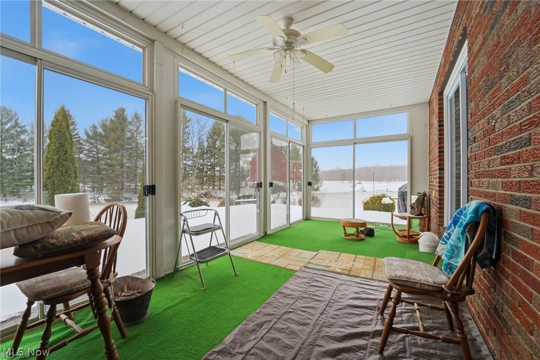 17452 Huntley Road Windsor, OH 44099 - Photo 13 of 49 Sunroom featuring brick wall