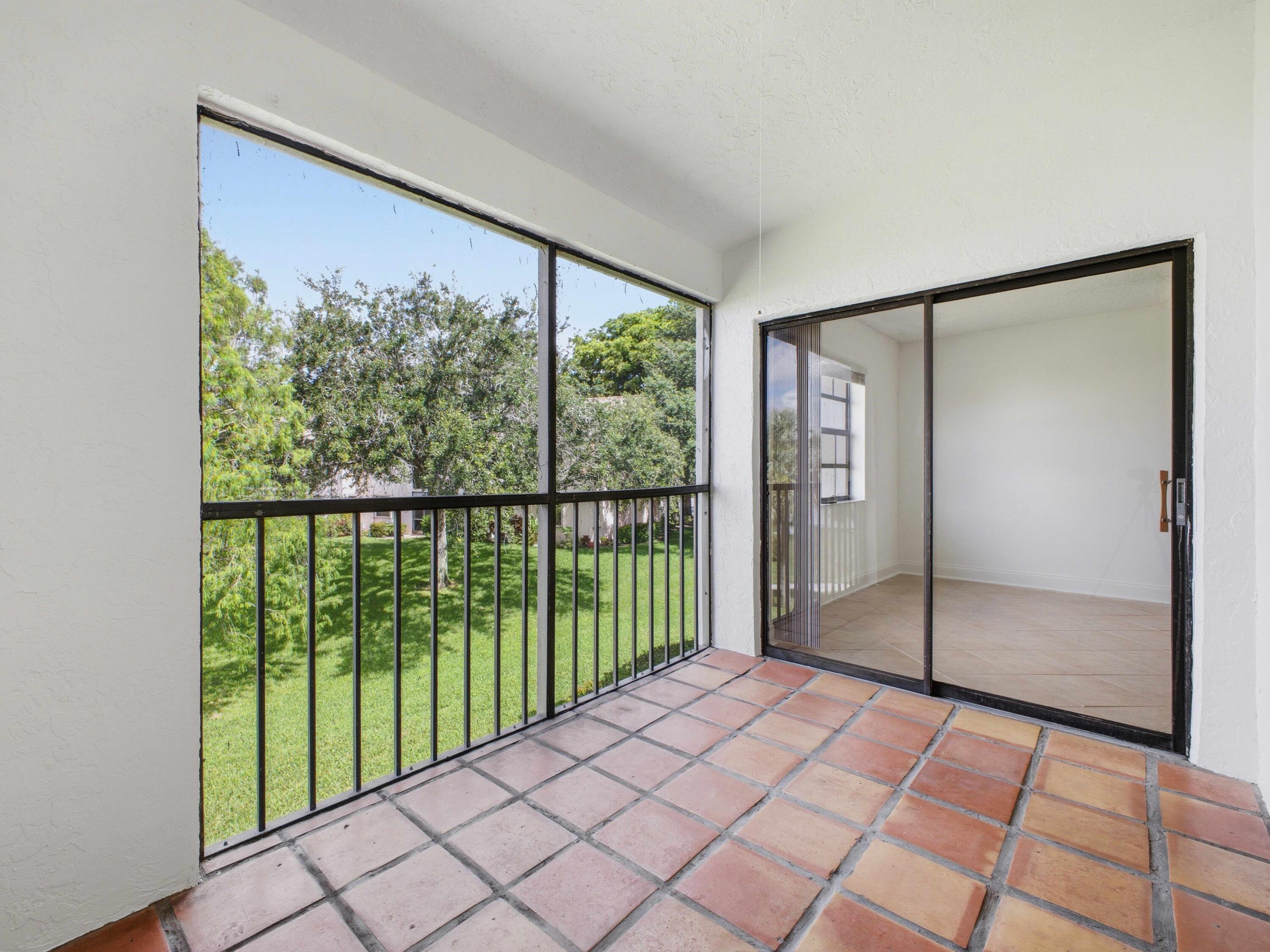 321 Norwood Terrace, Unit N221 Boca Raton, FL 33431 - Photo 16 of 36 Screened Balcony