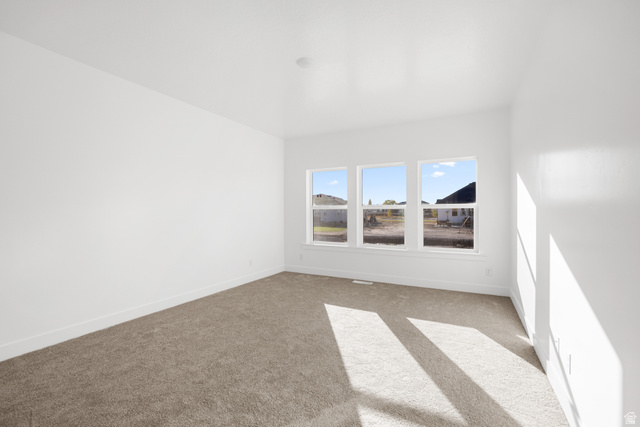 1510 West 600 North, Unit 4A Mapleton, UT 84664 - Photo 10 of 23 Carpeted spare room featuring baseboards