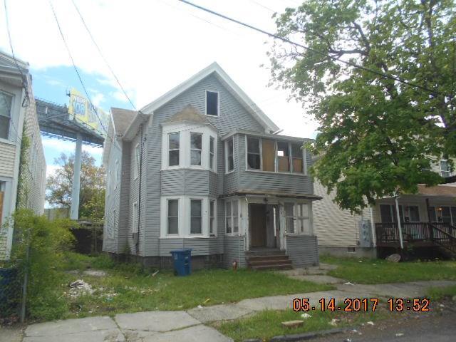 252 Beardsley Street Bridgeport, CT 06607 - Photo 1 of 1 a front view of a house with a yard