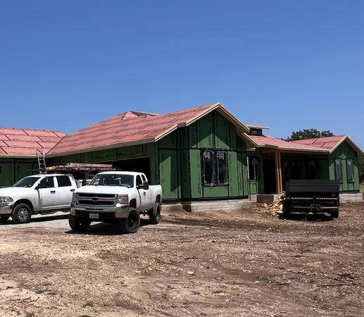 a view of a car park in front of house