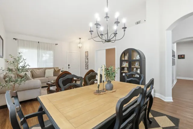 a view of a dining room with furniture