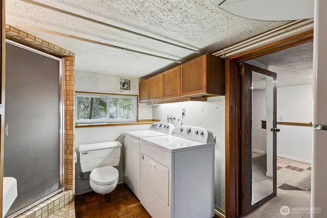 a view of bathroom with a sink toilet and shower