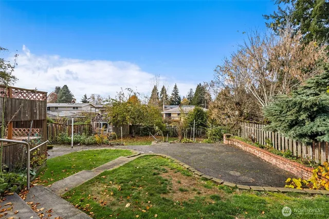 a view of a backyard with a garden