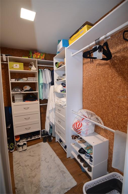 4420 Exeter Drive, Unit 208 Longboat Key, FL 34228 - Photo 17 of 28 a storage room with storage and utility