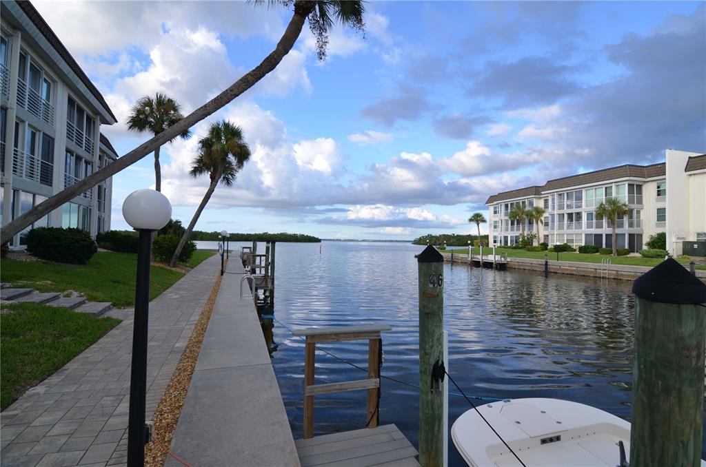 4420 Exeter Drive, Unit 208 Longboat Key, FL 34228 - Photo 20 of 28 a view of a lake