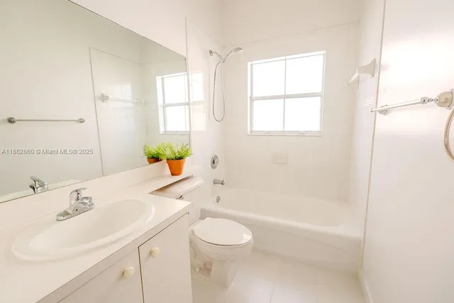 a view of a room that has a window in it