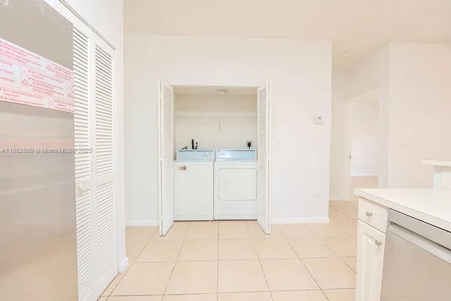 a view of a kitchen with a sink
