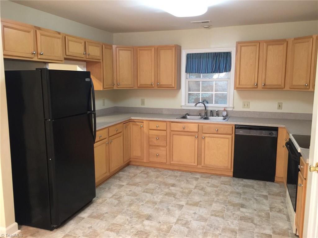 321 Burton Road Advance, NC 27006 - Photo 7 of 29 Beautiful, spacious kitchen has new flooring