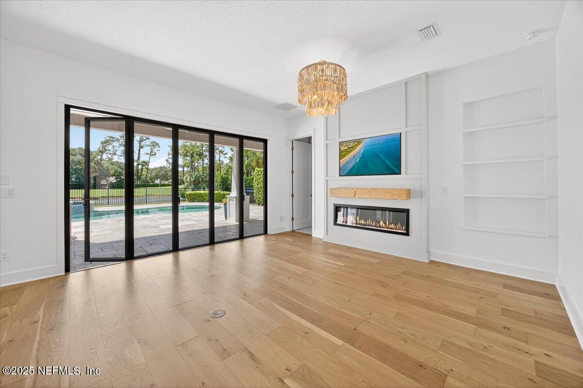 604 Timber Bridge Lane Atlantic Beach, FL 32233 - Photo 11 of 46 a view of an empty room with glass door