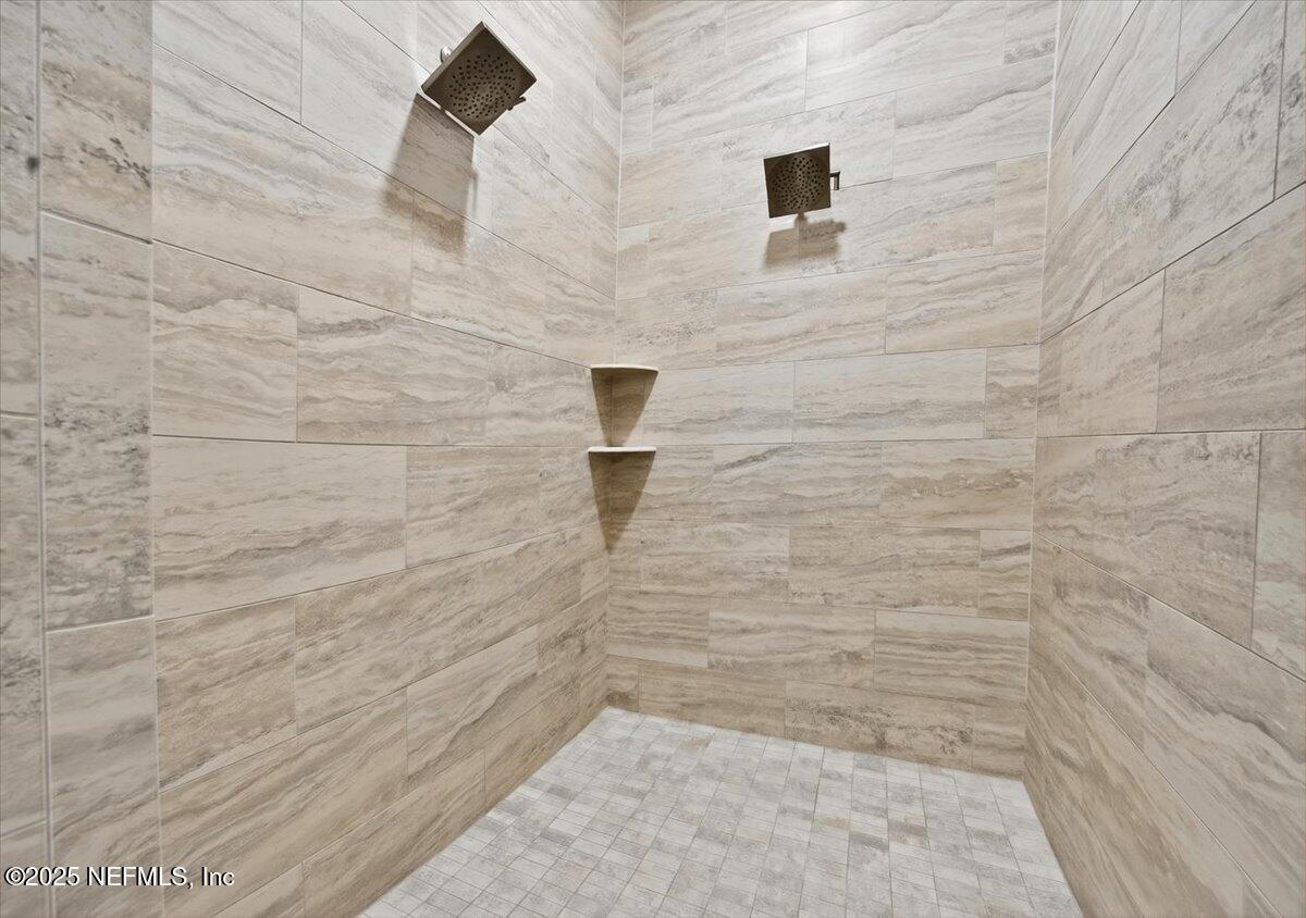 604 Timber Bridge Lane Atlantic Beach, FL 32233 - Photo 19 of 46 a bathroom with a shower