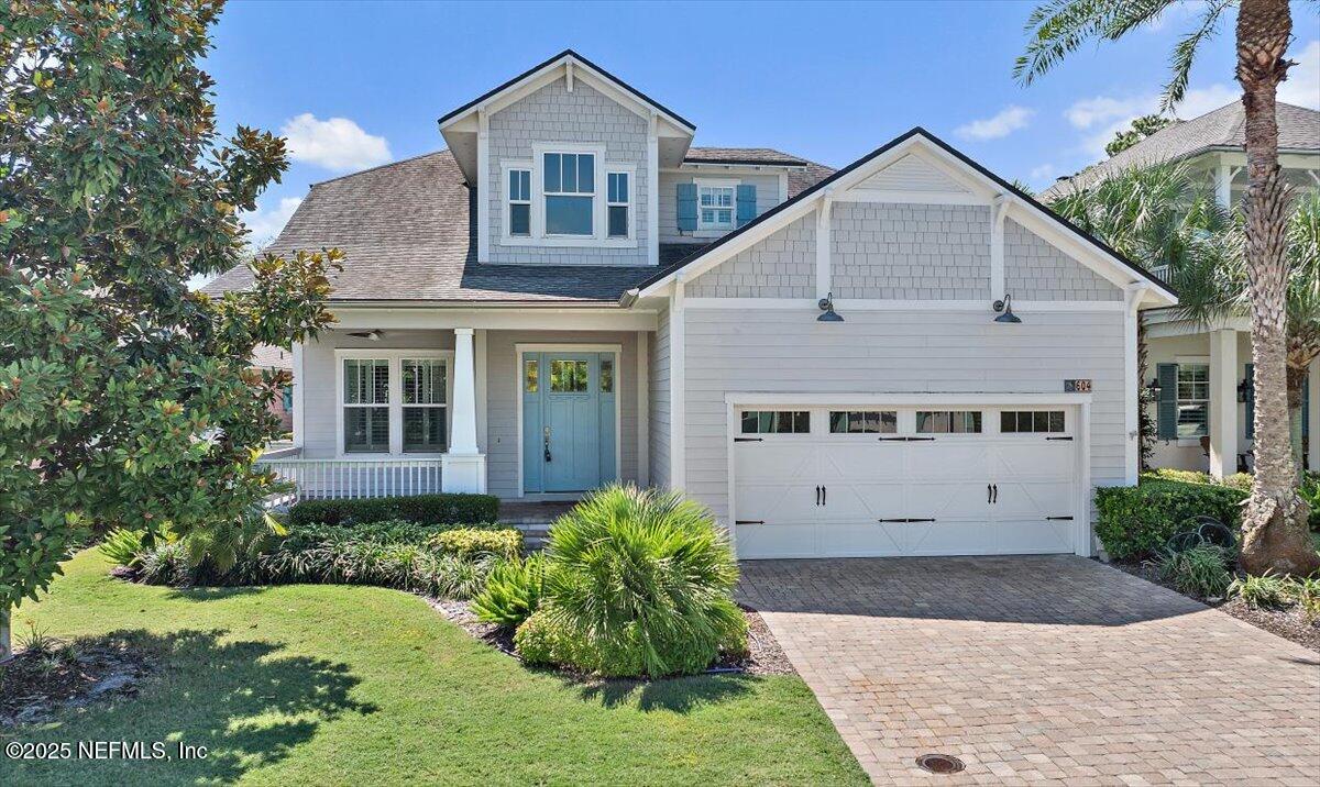 604 Timber Bridge Lane Atlantic Beach, FL 32233 - Photo 2 of 46 a view of a house with a yard