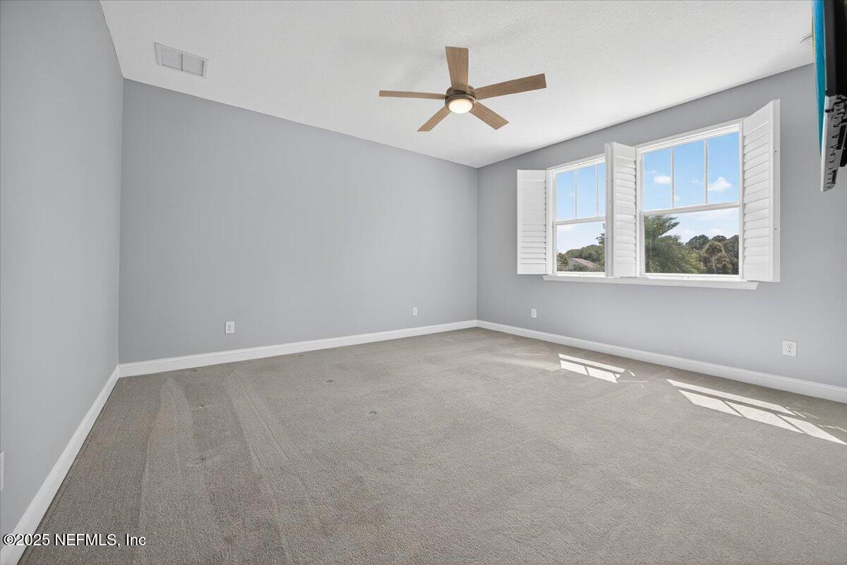 604 Timber Bridge Lane Atlantic Beach, FL 32233 - Photo 24 of 46 a view of an empty room with a window