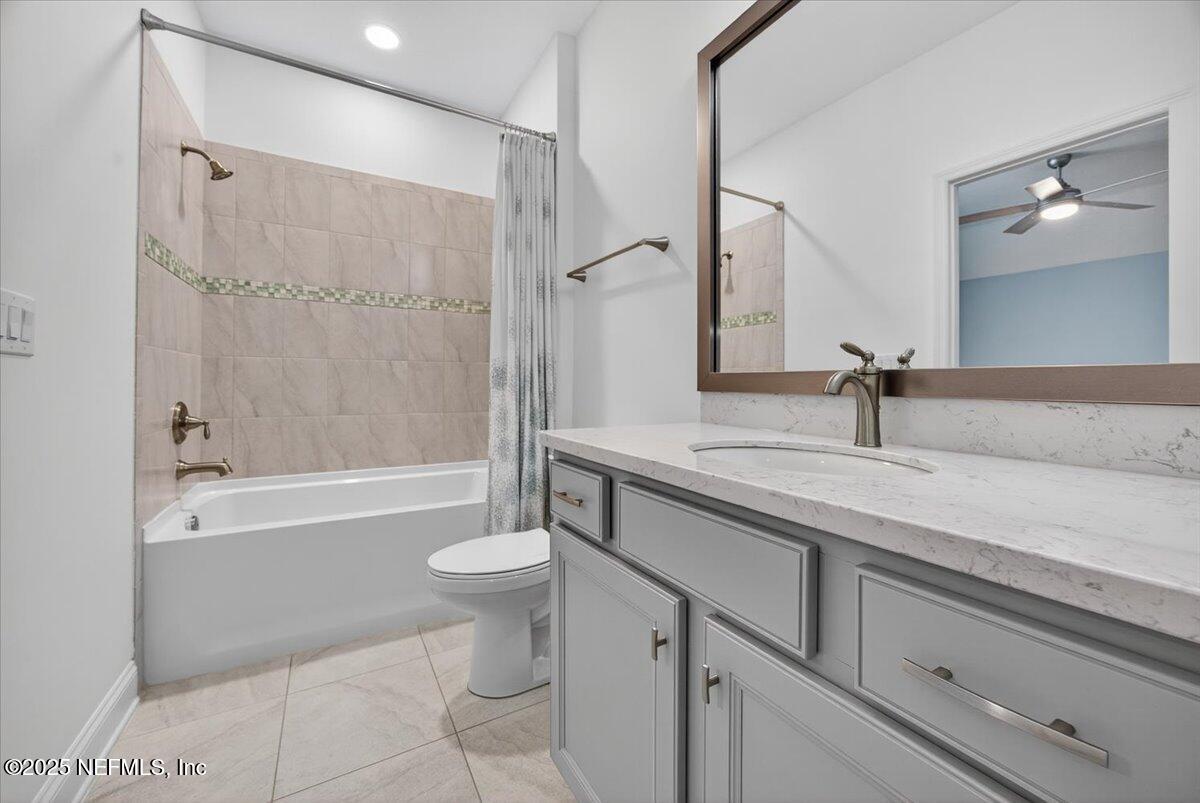 604 Timber Bridge Lane Atlantic Beach, FL 32233 - Photo 30 of 46 a bathroom with a sink a toilet and shower